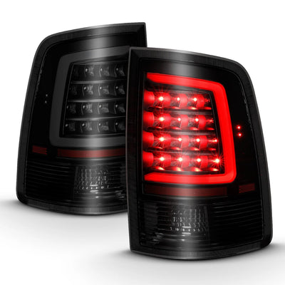 Anzo USA Dodge Ram 1500 (2009-2018), Dodge Ram 2500 / 3500 (2010-2018), and Ram 1500 Classic (2019-2023) LED C Bar Tail Lights Black Smoke Lens (ANZ311319)