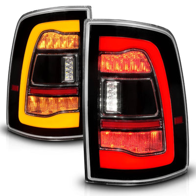 Anzo USA Dodge Ram 1500 (2009-2018), Dodge Ram 2500 / 3500 (2010-2018), and Ram 1500 Classic (2019-2023) LED Tail Lights Black Clear Lens w/ Amber Sequential Signal (For All Models) (ANZ311471)