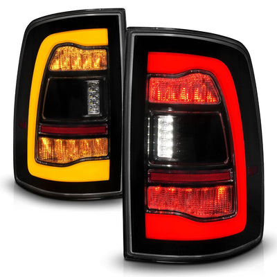 Anzo USA Dodge Ram 1500 (2009-2018), Dodge Ram 2500 / 3500 (2010-2018), and Ram 1500 Classic (2019-2023) LED Tail Lights Black Smoke Lens w/ Amber Sequential Signal (For All Models) (ANZ311472)
