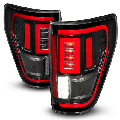 Anzo USA Ford F-150 (2021-2023) Black Full LED Tail Lights w/ Clear Lens, Initiation & Sequential Signal Halogen w/ BLIS (ANZ311475)