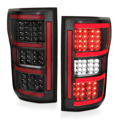 Anzo USA Ford F-150 (2018-2020) Black Tail Lights w/ Clear Lens & Red Light Bar LED Bar, LED Turn Signal, LED Brake, LED Parking, and LED Reverse (ANZ321338)