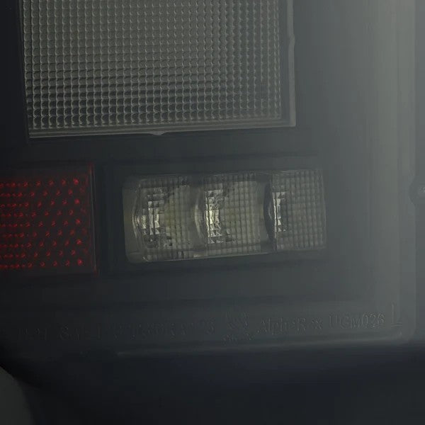 Alpharex Chevrolet Silverado 1500 (2019-2026) / 2500HD/3500HD (2020-2026) LUXX-Series LED Tail Lights Black Smoke (RTL-CL19-SA-YW-BS-TM) (ARX620058)