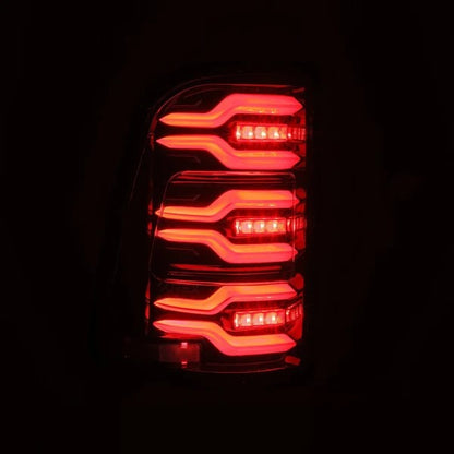 Alpharex Dodge Ram 1500 (2019-2024) LUXX-series LED tail lights Alpha-Black With Clear Lens and switchable LED tubes (MPN: RTL-DR19-SA-YS-LB) (ARX640030)