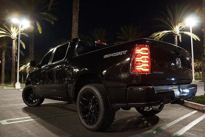 Alpharex Dodge Ram 1500 (2019-2024) LUXX-series LED tail lights Alpha-Black With Clear Lens and switchable LED tubes (MPN: RTL-DR19-SA-YS-LB) (ARX640030)