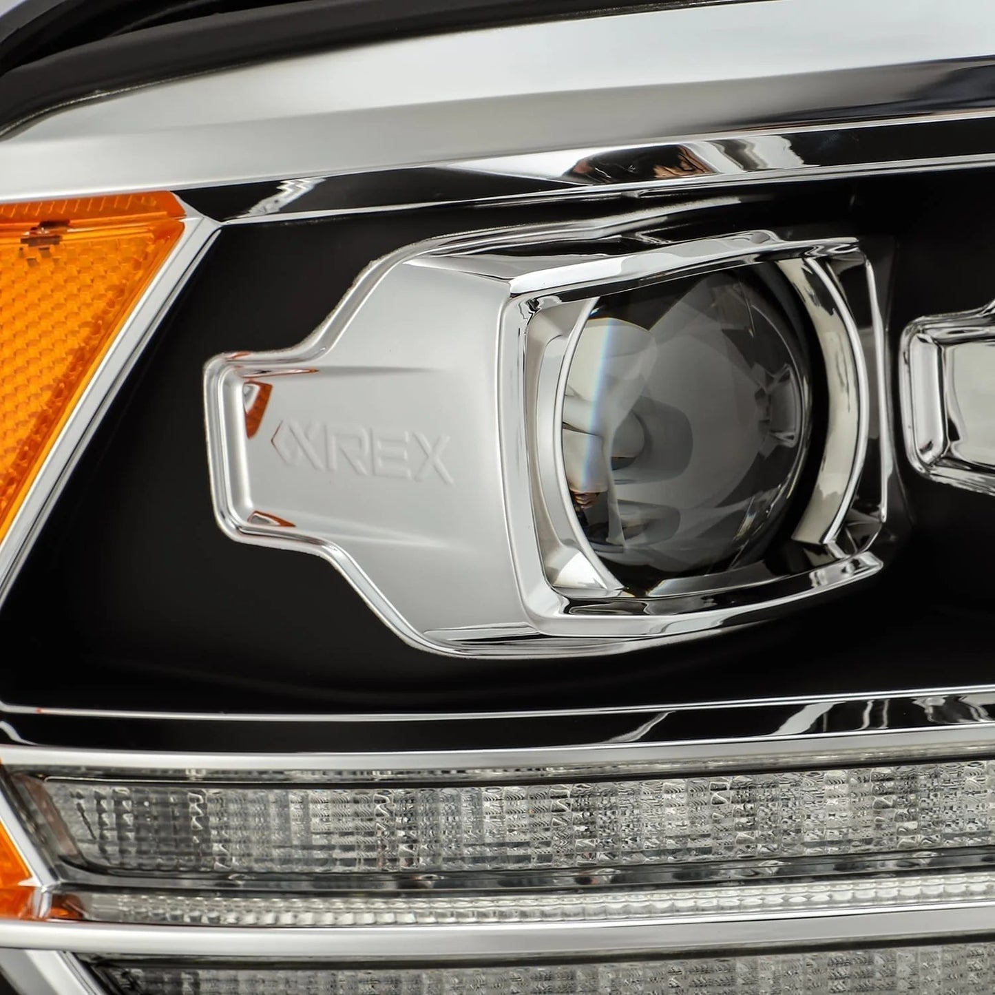 AlphaRex Black Plank Style Halogen Projector Headlights w/ Top Bottom DRL & Sequential Signal for 2009-2018 Ram 1500/2500/3500 & 2019-2024 Ram Classic (SKU ARX880523 / AHL-DR09-P-G4-SA-B)