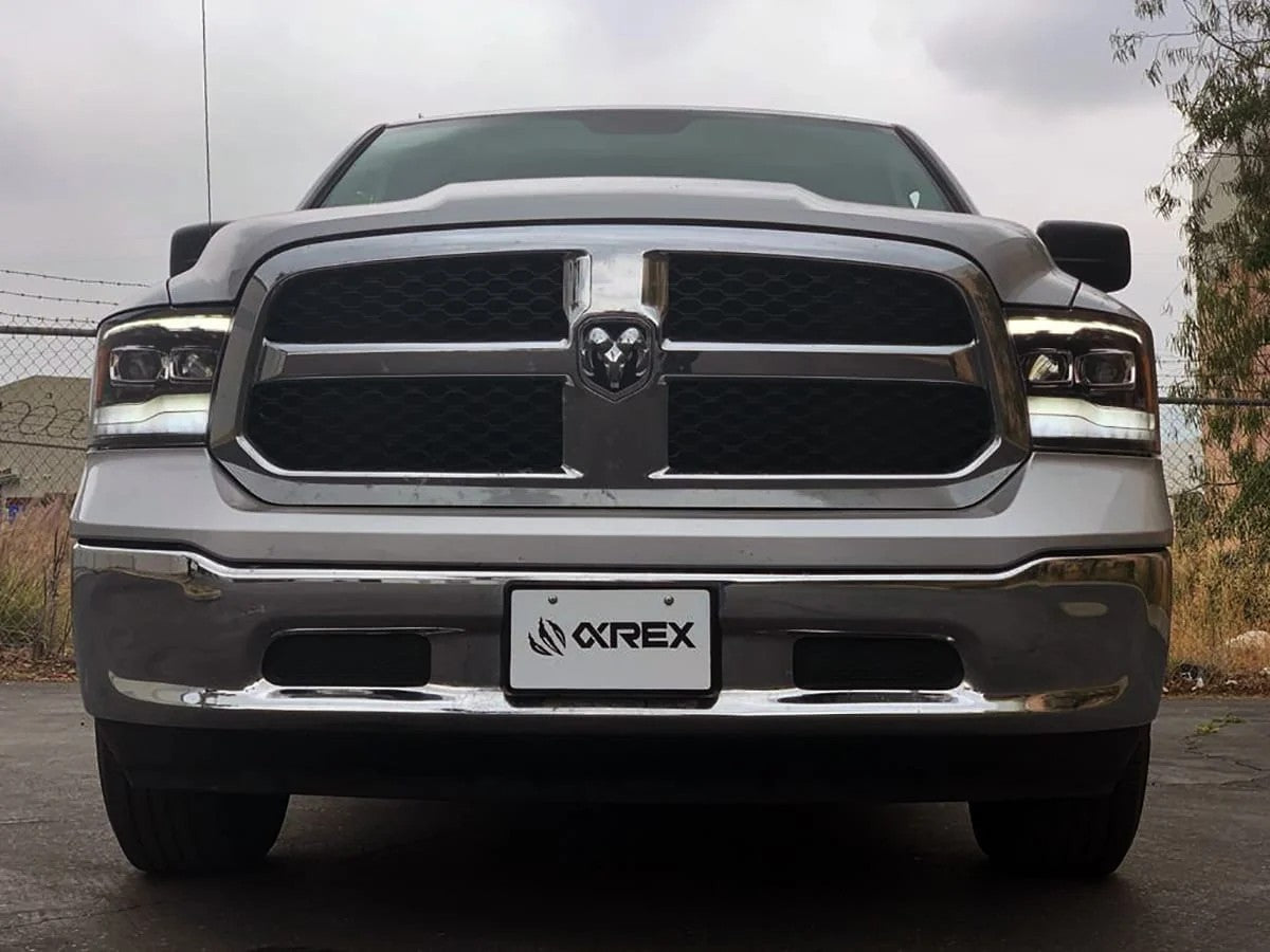 AlphaRex Alpha-Black Plank Style Halogen Projector Headlights w/ Sequential Signal DRL for 2009-2018 Ram 1500 & 2019-2024 Ram 1500 Classic (SKU ARX880542 / AHL-DR09-P-G3-SA-FLB)