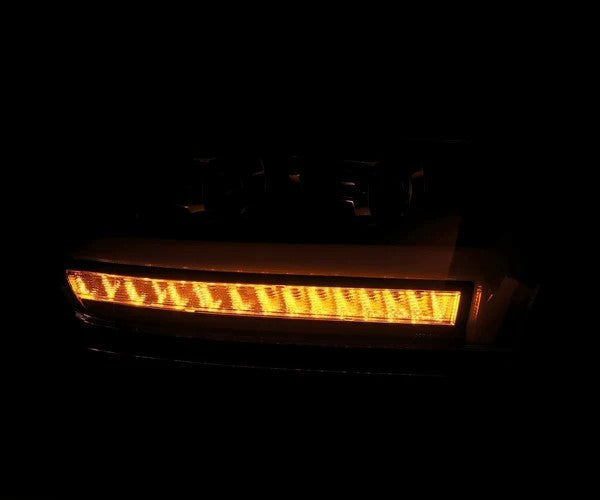 Alpharex Dodge Ram 1500 (2019–2024) LUXX-Series headlights Black Housing / Clear Lens / 2019–2024 Ram Classic Model, Limited Longhorn, Limited, and TRX trims. (ARX880543)
