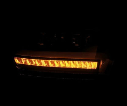 Alpharex Dodge Ram 1500 (2019–2024) LUXX-Series headlights Black Housing / Clear Lens / 2019–2024 Ram Classic Model, Limited Longhorn, Limited, and TRX trims. (ARX880543)