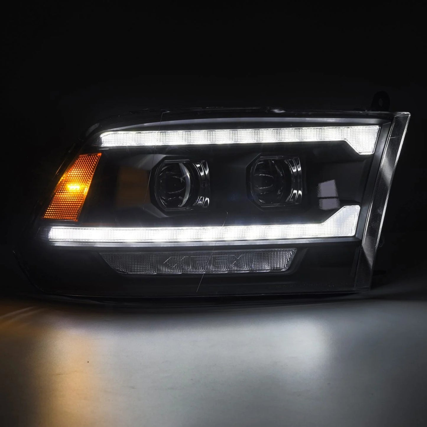 AlphaRex Black Plank Style Halogen Projector Headlights w/ Sequential Signal & DRL for 2009-2018 Ram 1500 & 2019-2024 Ram 1500 Classic (SKU ARX880561 / AHL-DR09-G5-P-S-B)