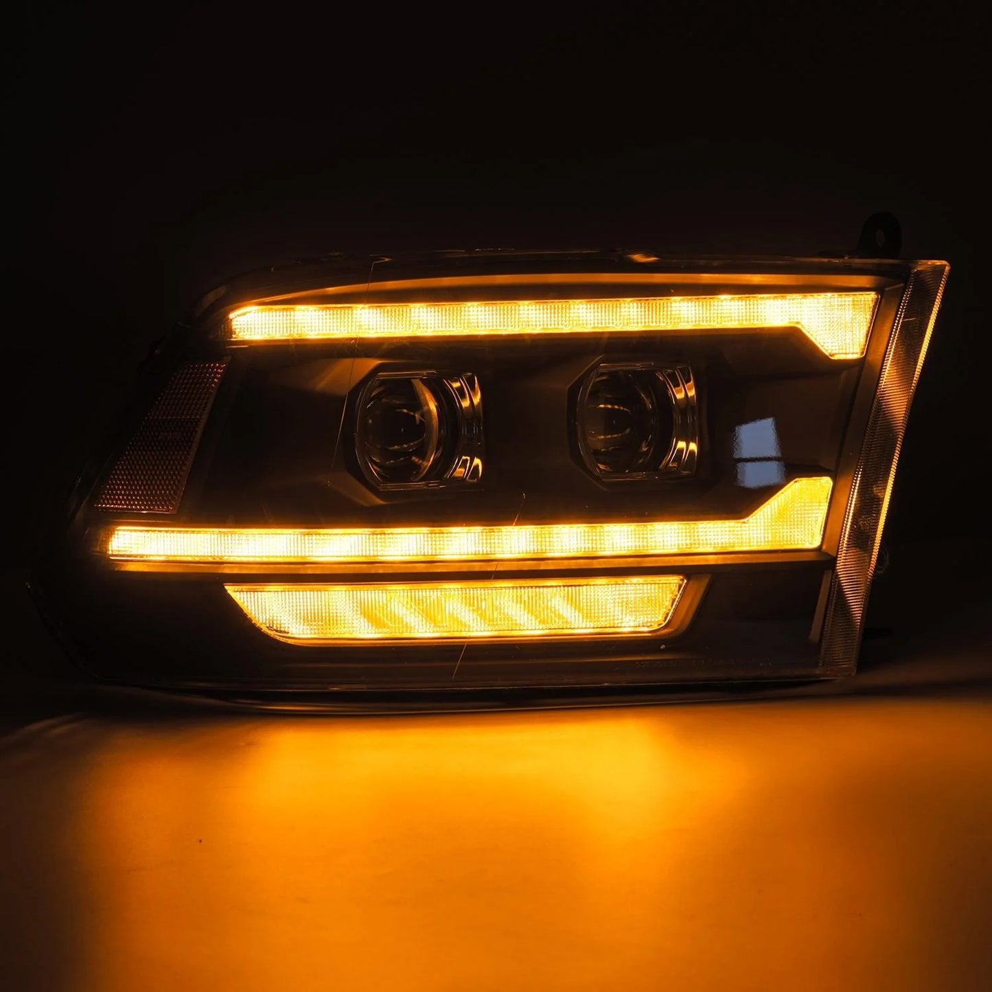 AlphaRex Black Plank Style Halogen Projector Headlights w/ Sequential Signal & DRL for 2009-2018 Ram 1500 & 2019-2024 Ram 1500 Classic (SKU ARX880561 / AHL-DR09-G5-P-S-B)