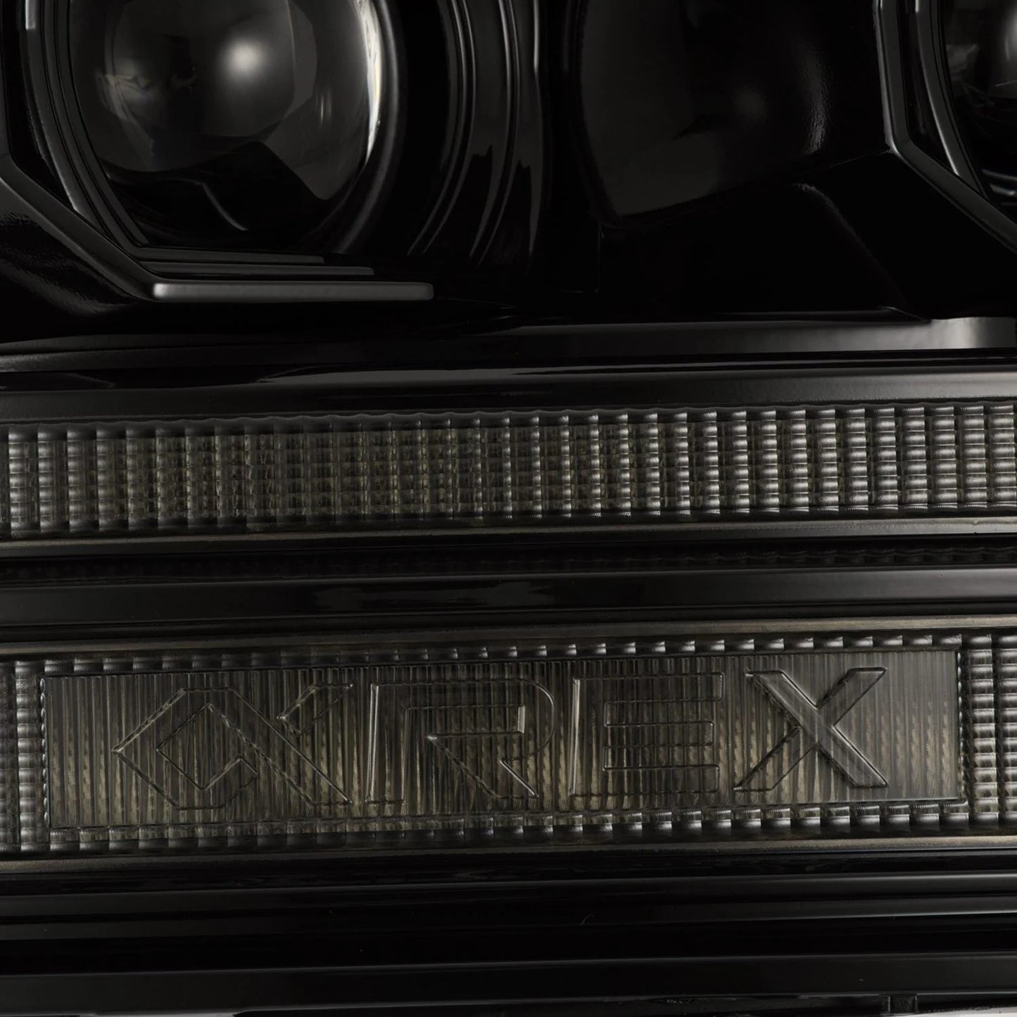 AlphaRex Alpha-Black Halogen Projector Headlights w/ Sequential Signal & Top Middle DRL for 2009-2018 Ram 1500 & 2019-2024 Ram 1500 Classic (SKU ARX880563 / AHL-DR09-G5-P-S-FLB)