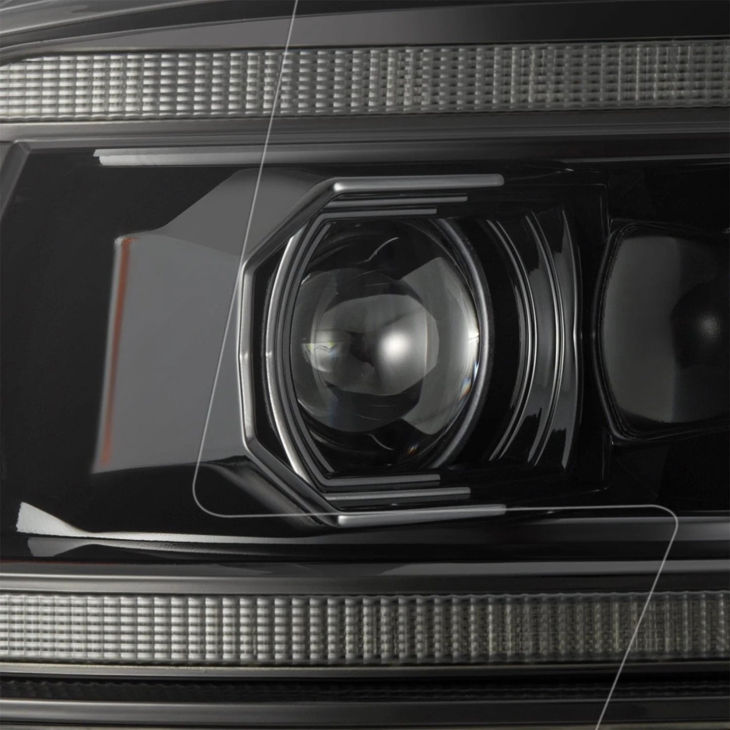 AlphaRex Alpha-Black Halogen Projector Headlights w/ Sequential Signal & Top Middle DRL for 2009-2018 Ram 1500 & 2019-2024 Ram 1500 Classic (SKU ARX880563 / AHL-DR09-G5-P-S-FLB)