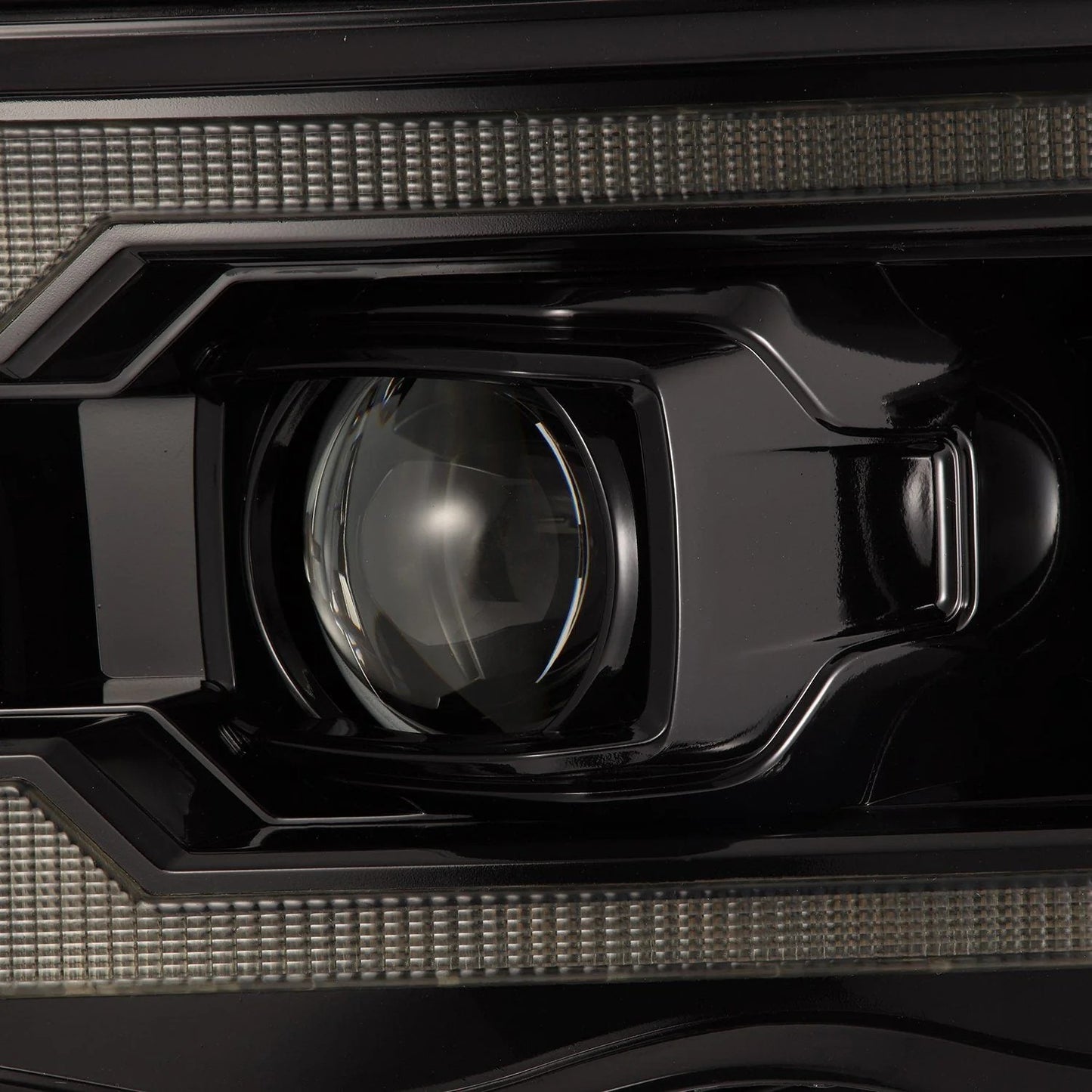 AlphaRex Alpha-Black Projector Headlights w/ Sequential Signal & DRL for 2002-2005 Dodge Ram 1500 & 2003-2005 Dodge Ram 2500/3500 (SKU ARX880572 / AHL-DR02-P-S-FLB)